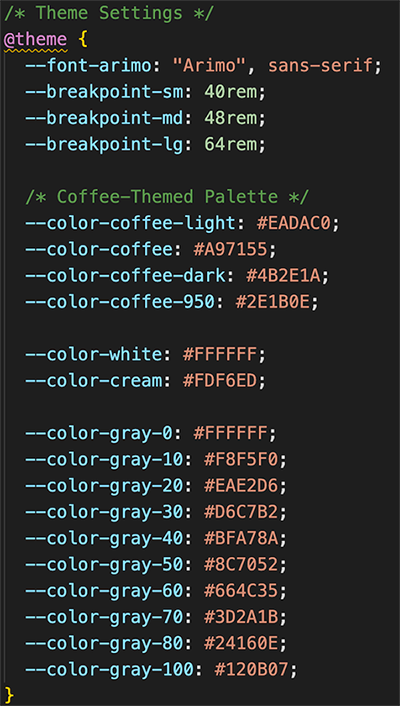 The input.css file showing custom theme variables and a reusable card class using @apply